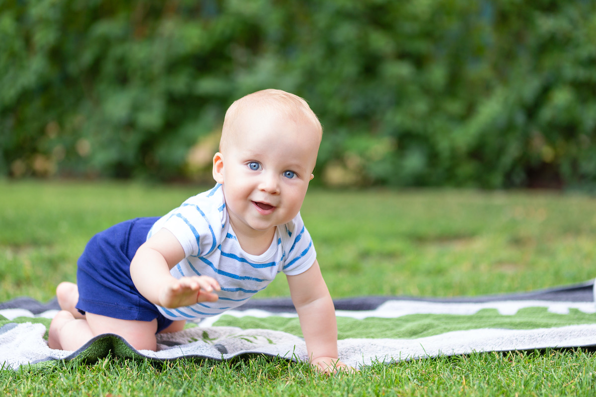 baby playing on real lawn.jpg