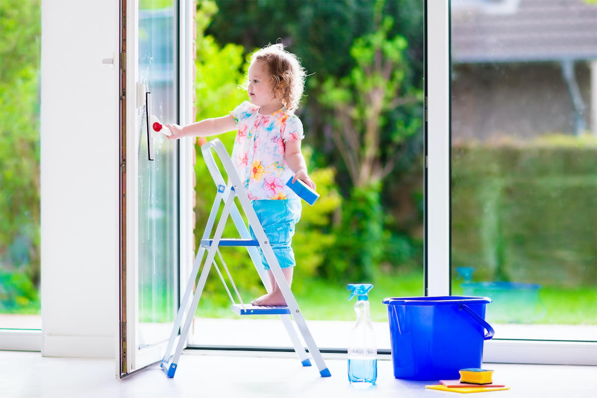 girl cleaning windows